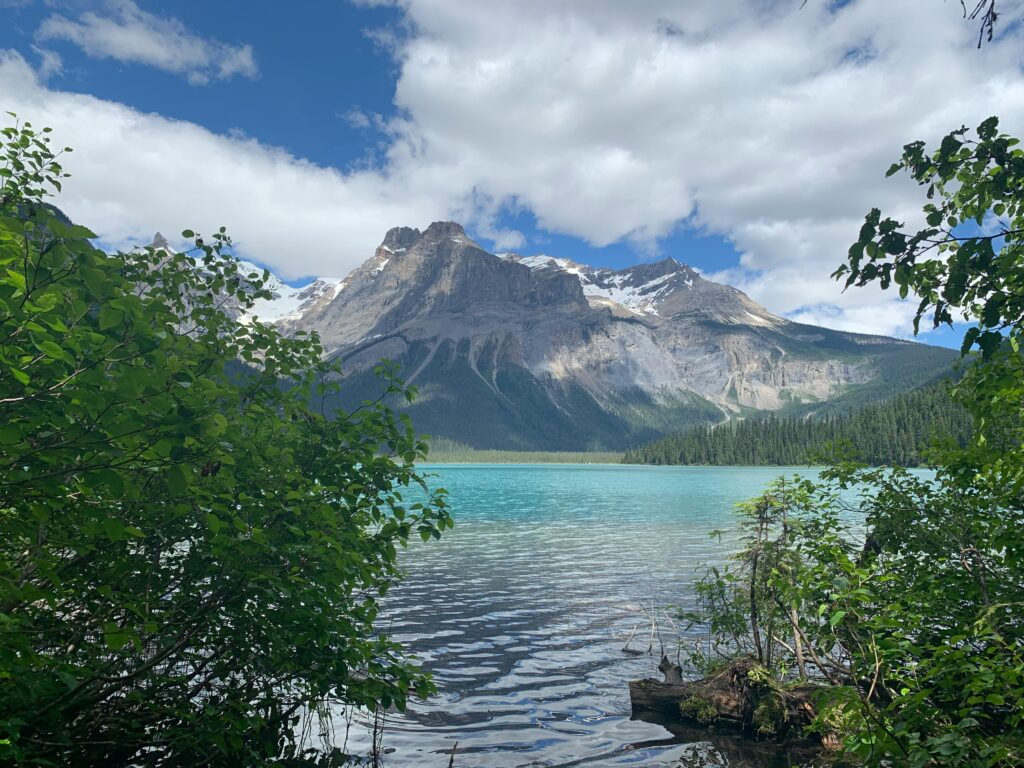 Stunning view of Emerald Lake surrounded by the Rocky Mountains in Yoho National Park, BC.