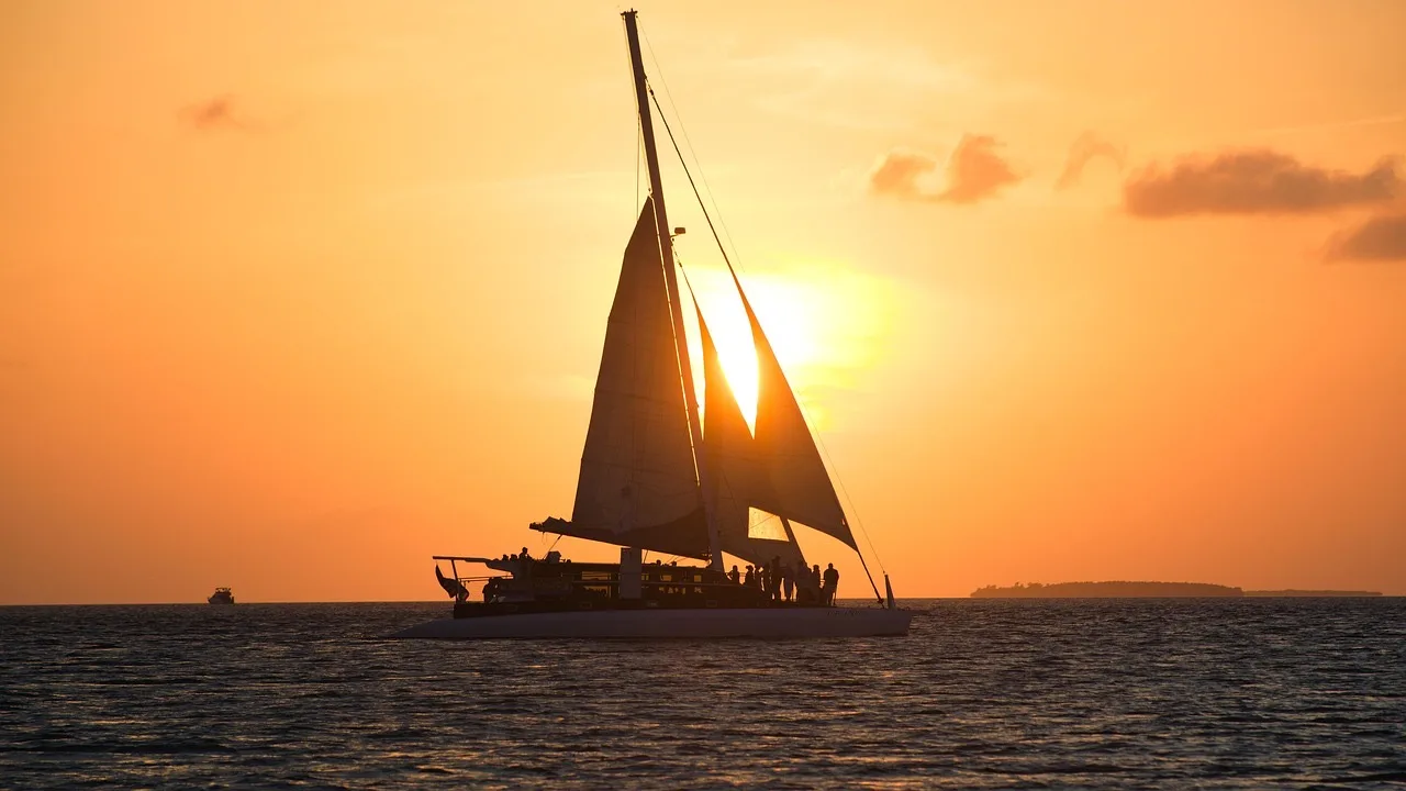 key west, florida, sunset, ocean, scenic, tropical paradise, coastal beauty, evening sky, nautical, serene, waterfront, nature, maritime, sunset colors, island life, sailing, natural beauty, vacation destination, southernmost point, sea view, sun setting, calm waters, travel photography, ocean sunset, coastal sunset, key west sunset